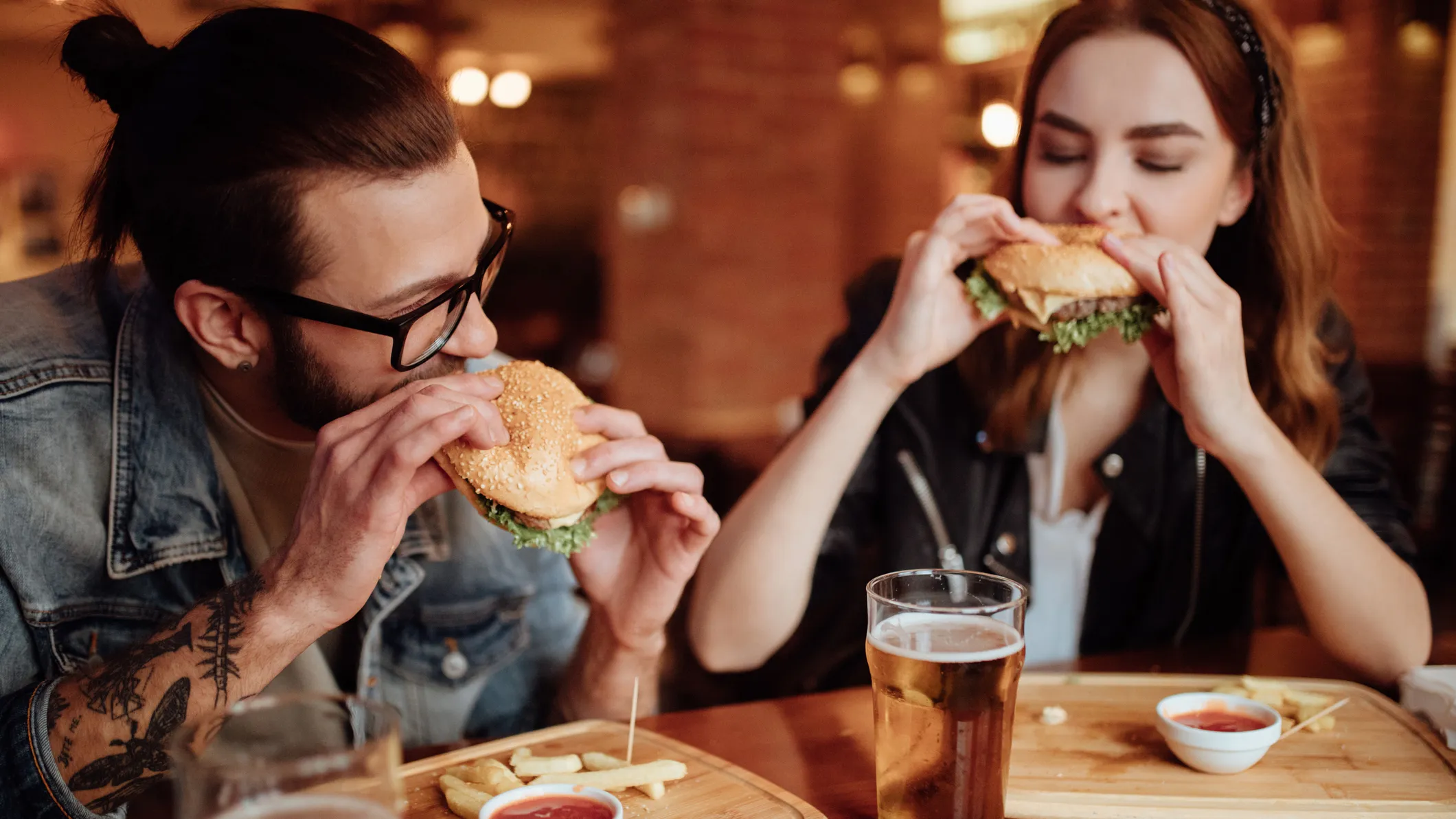 People eating burgers